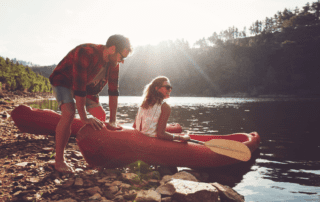 Picture of couple boating on Broken Bow Lake.