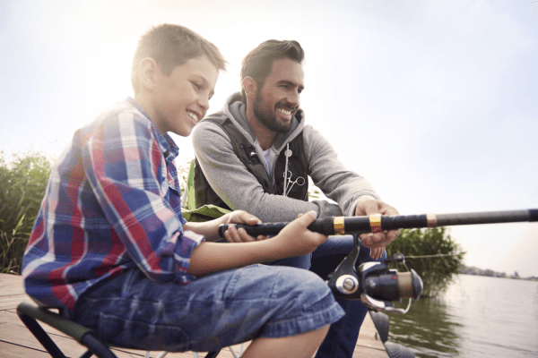 Picture of father and son on a Broken Bow Lake fishing adventure.