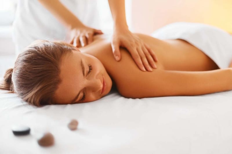 Woman getting back massage.