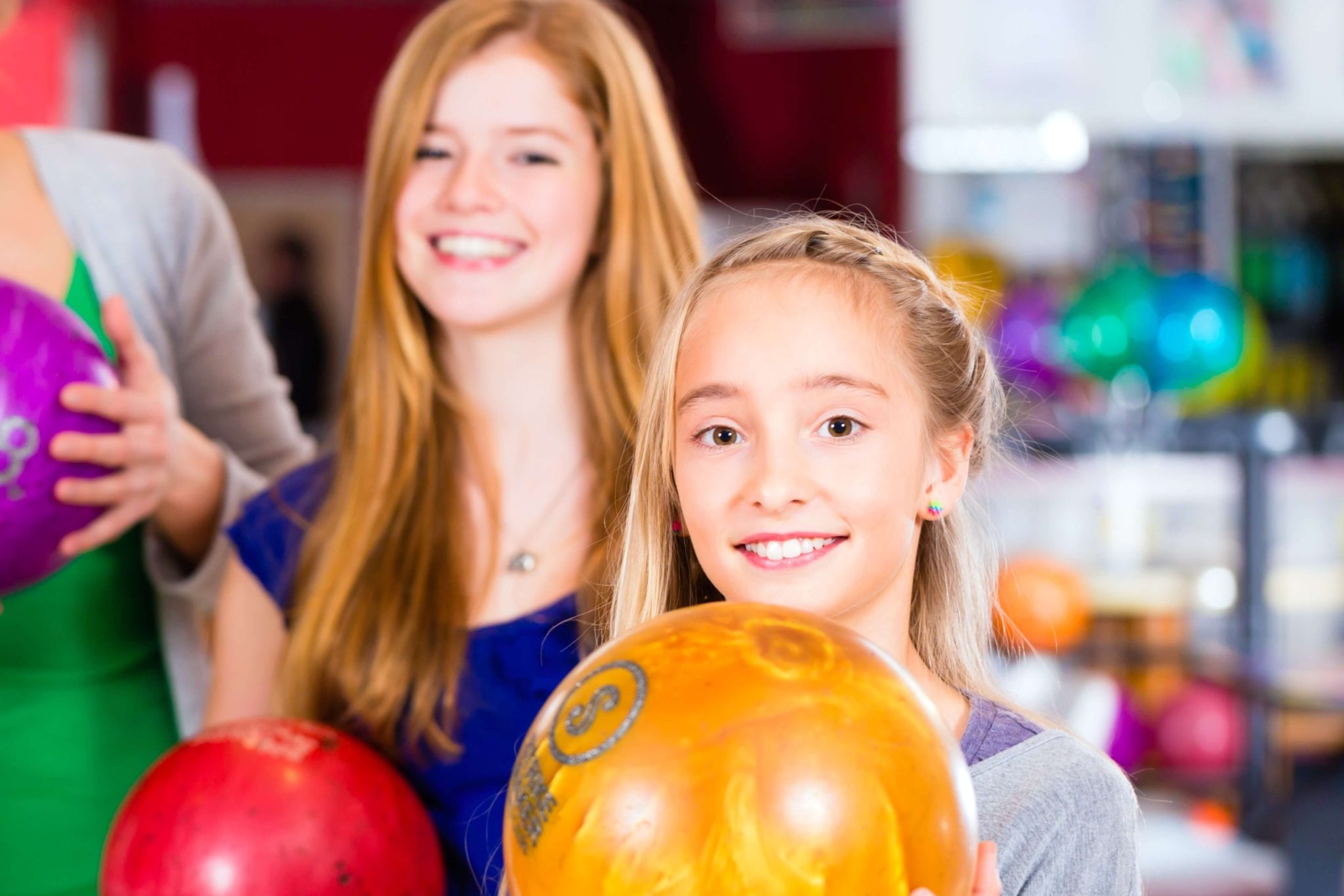 Two girls Bowling in Broken Bow.