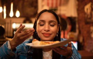 A woman enjoying Hochatown Restaurants.