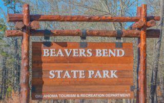A sign to the Beavers Bend State Park.