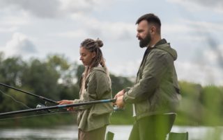 A woman and a man fishing in Broken Bow.